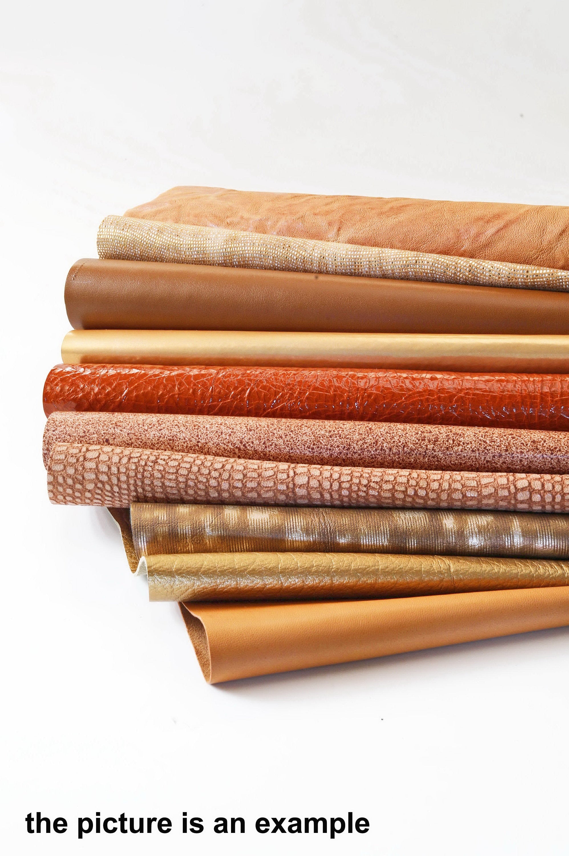 Brown leather scaps lot, mix large cognac leather pieces, random renmants mix of smooth printed and laminated leather 10 or 15 pcs B084
