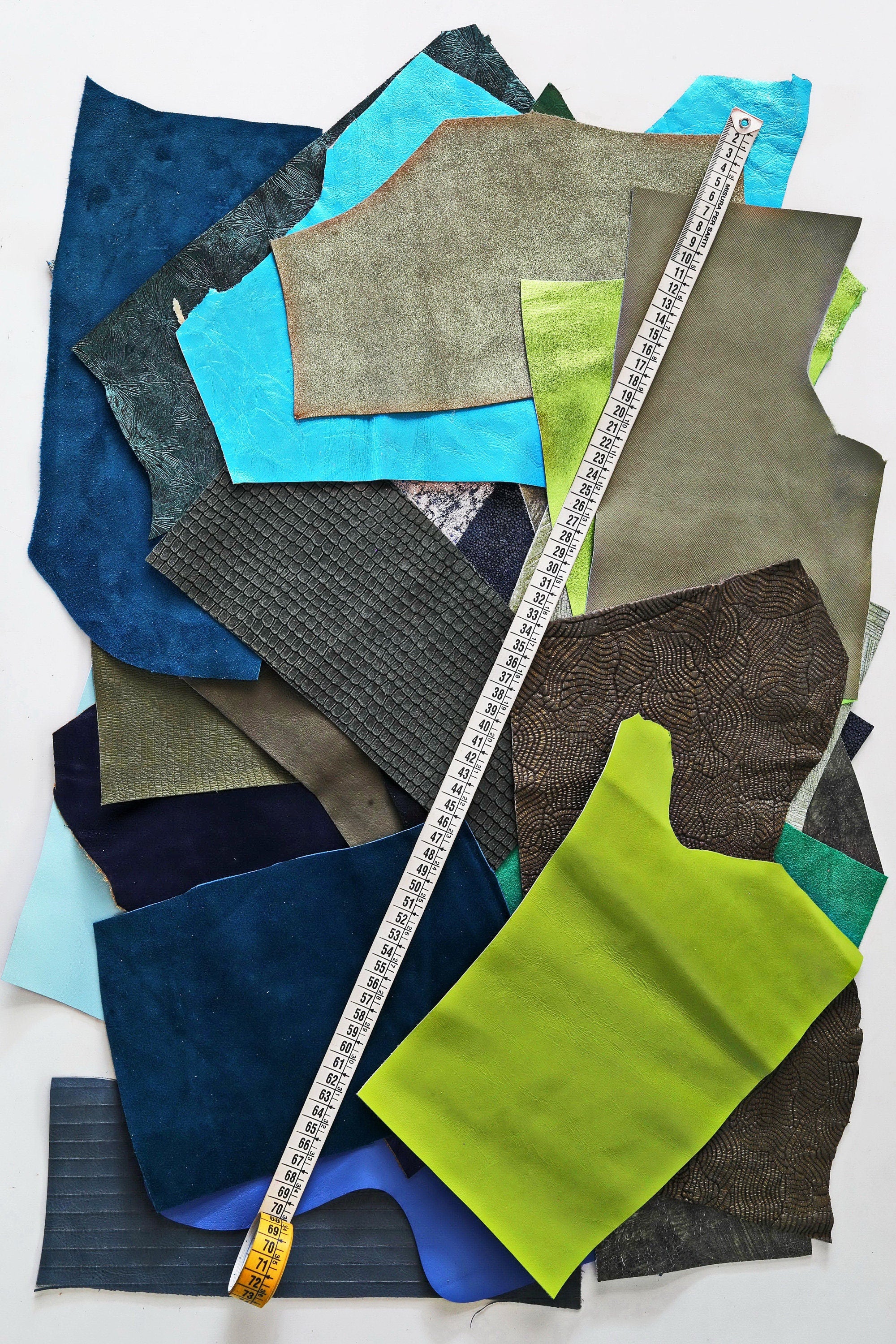 Blue green LEATHER scraps mix, printed and laminated leather pieces with different softness sold by weight 0.300–1 kg B079 La Garzarara