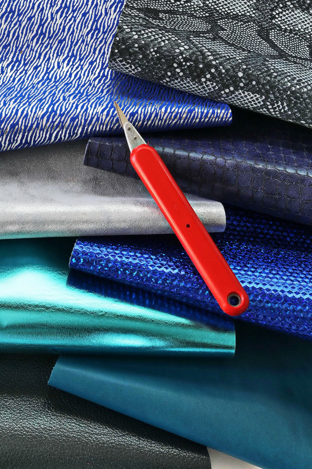 Blue leather SCRAPS, random mixed remnants skins and offcuts hides , solid colors and patterns in light and dark blue tones 0.5 kg B1320-RC