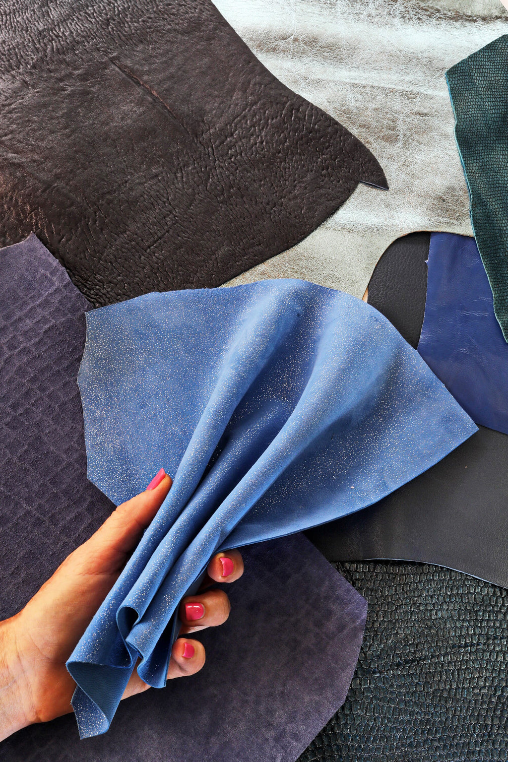Blue leather SCRAPS, random mixed remnants skins and offcuts hides , solid colors and patterns in light and dark blue tones 0.5 kg B1320-RC