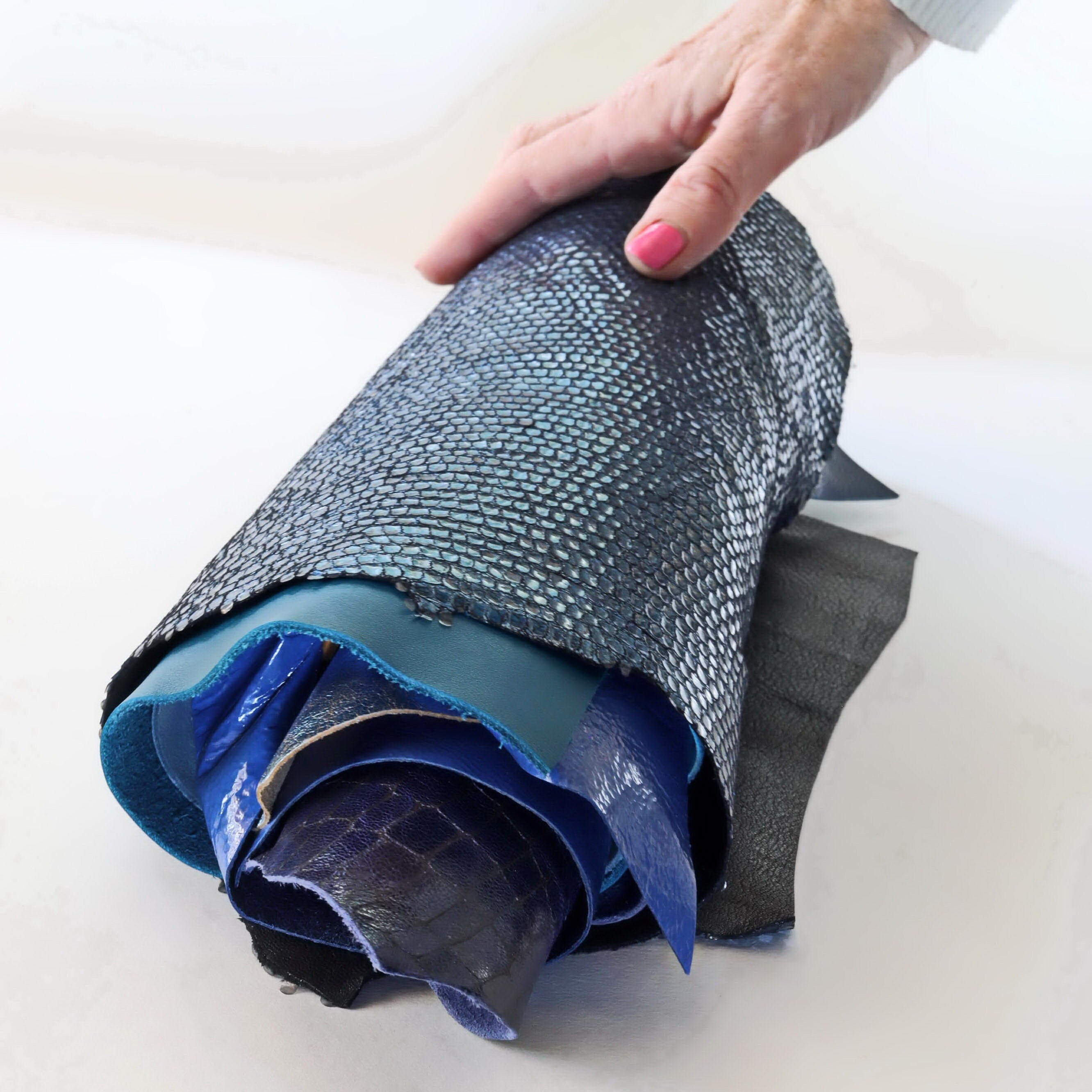 Blue leather SCRAPS, random mixed remnants skins and offcuts hides , solid colors and patterns in light and dark blue tones 0.5 kg B1320-RC