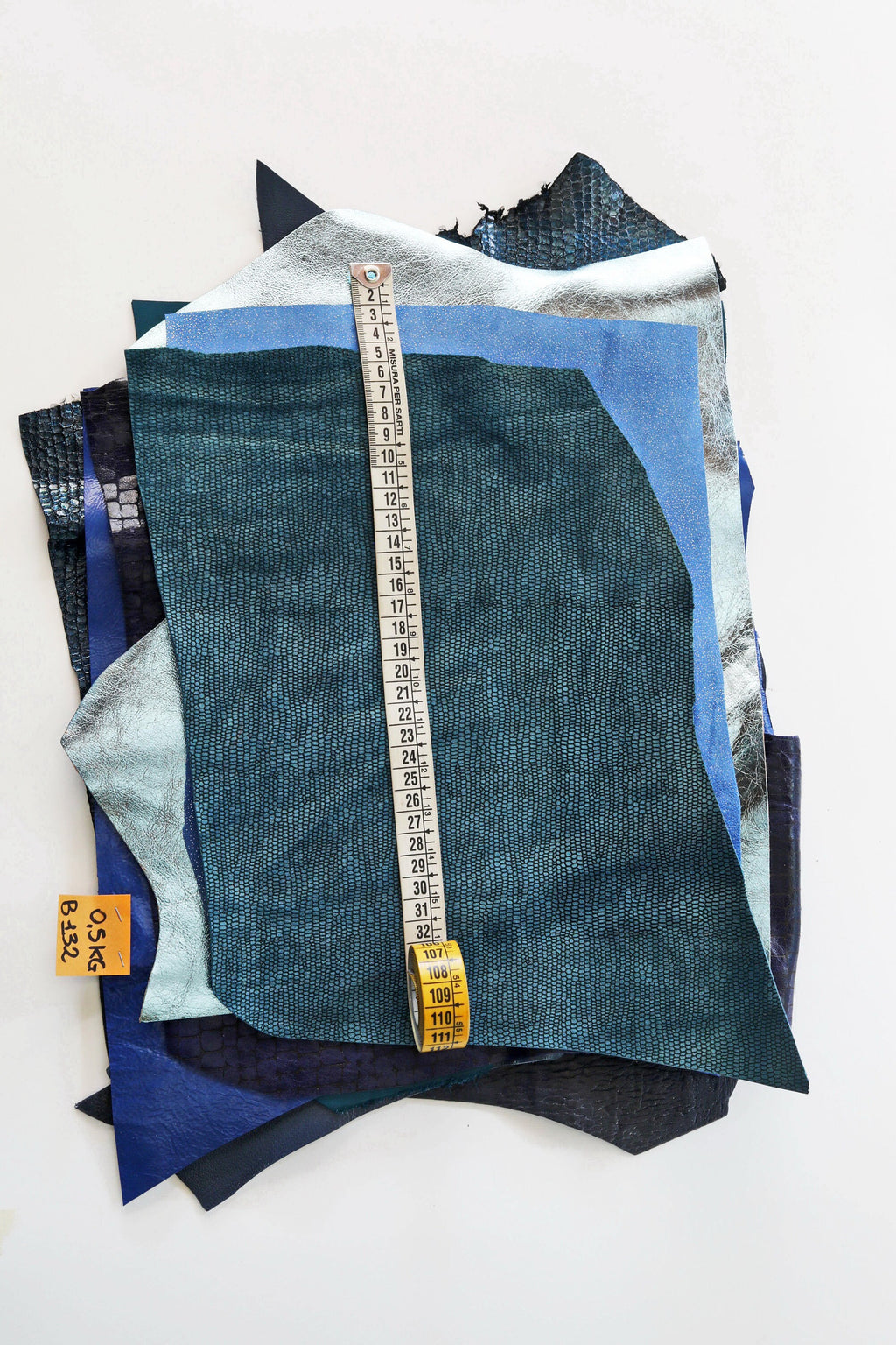 Blue leather SCRAPS, random mixed remnants skins and offcuts hides , solid colors and patterns in light and dark blue tones 0.5 kg B1320-RC