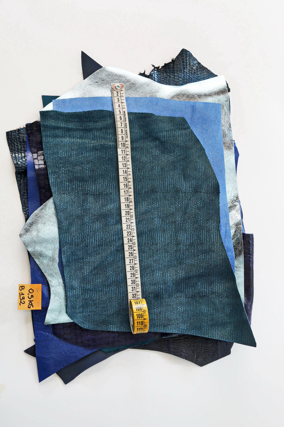 Blue leather SCRAPS, random mixed remnants skins and offcuts hides , solid colors and patterns in light and dark blue tones 0.5 kg B1320-RC