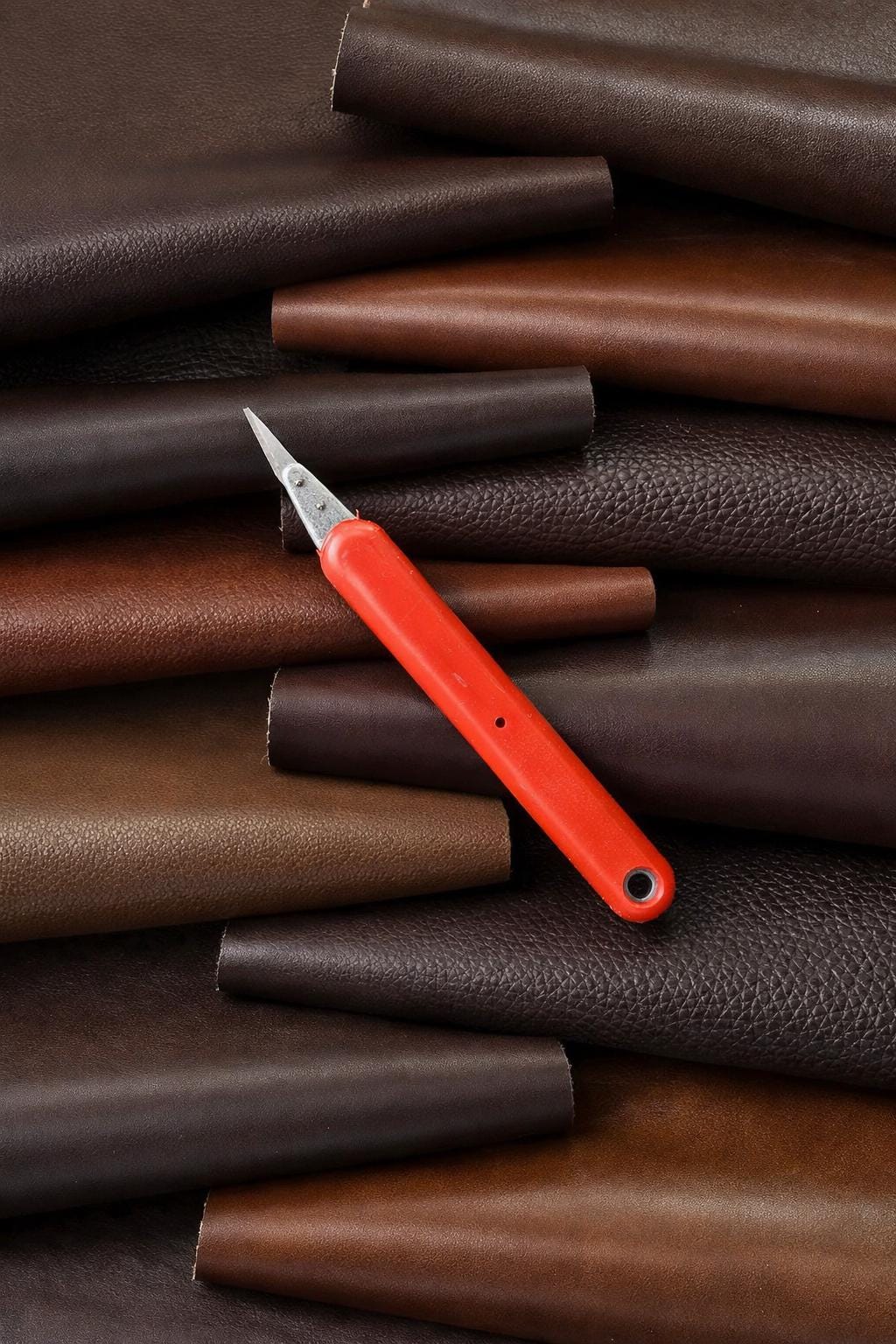 Brown Leather calf PIECES, solid and pebbled colors random assortment, thickness 1.0-1.2mm (3-4oz) 1 kg (2 lbs) - 2 kg (4 lbs) B112