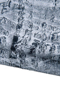 Può includere: Primo piano di materiale strutturato con un aspetto invecchiato e screziato. La superficie è prevalentemente bianca con accenti grigio scuro e neri, creando una texture ruvida, quasi simile alla pietra. Il materiale sembra essere piegato o stratificato.